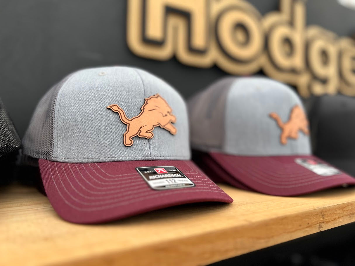 Gray and Red Leather Patch Hats with a Lion logo