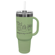 Sage green travel mug with personalized plant logo and text engraved on a white background